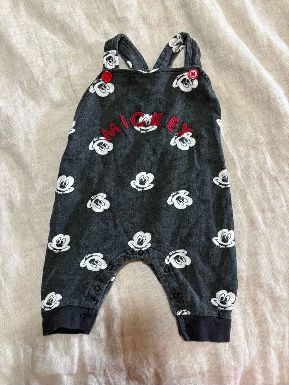 6-9 month Disney Black Mickey Face Print One-Piece with Red Accents